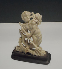 Schnitzerei  Figur auf